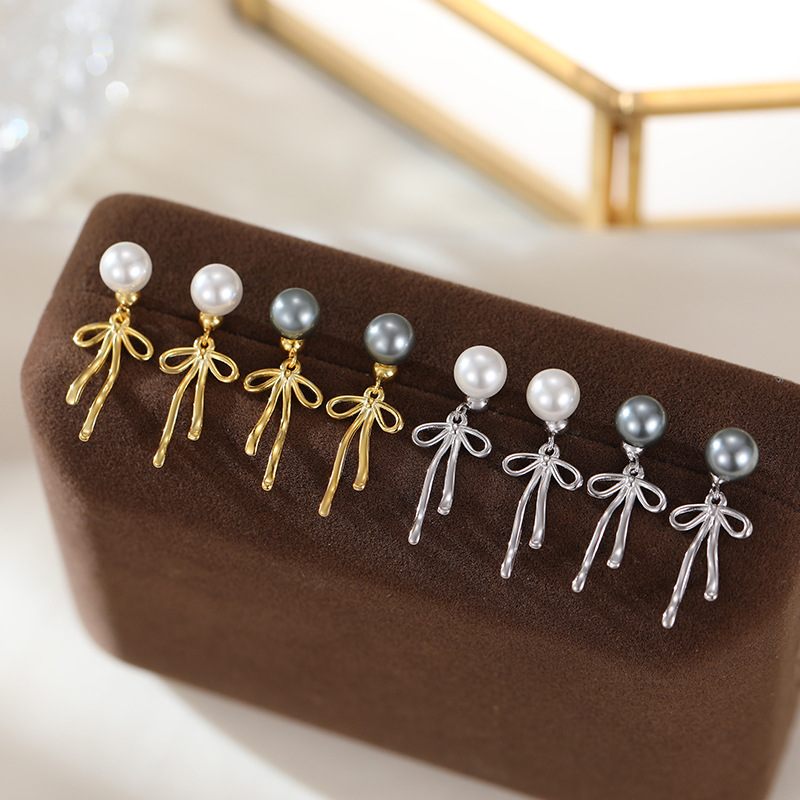 S925 Sterling Silver Pearl Bow Stud Earrings - Image 2